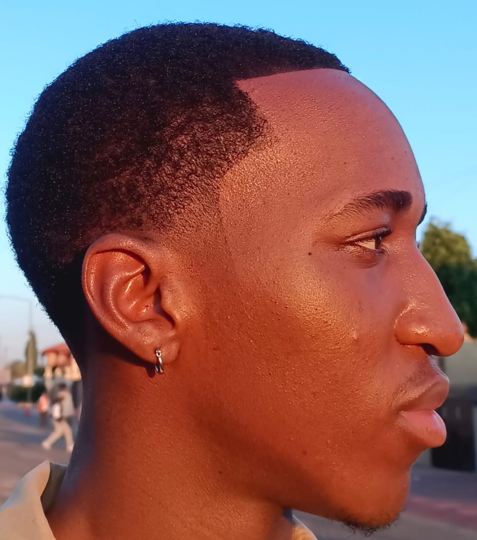 Side profile of a fresh taper fade