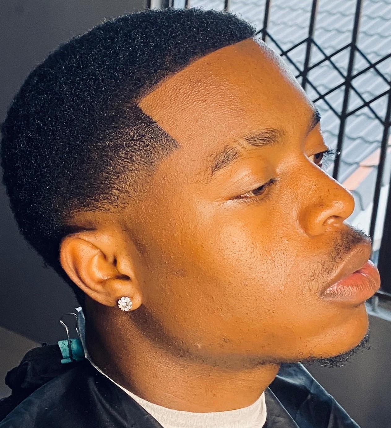 Front profile of an afro taper cut